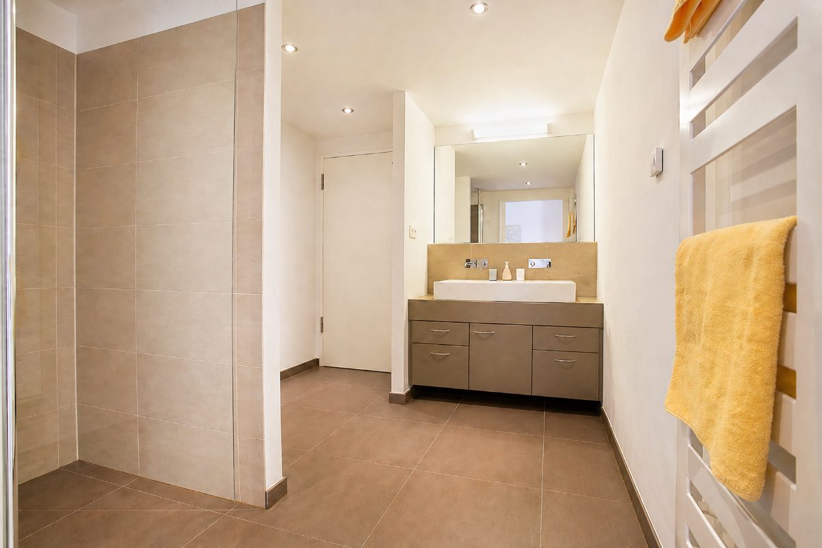 Bathroom with shower and sink