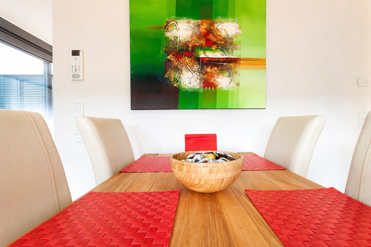 Dining table with chairs and painting