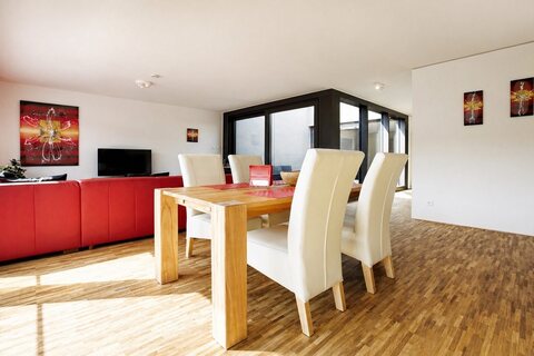 Furnished apartment dining and living area