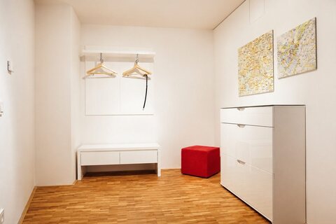 Entry with coat rack and dresser
