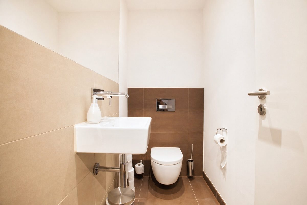 Small bathroom with sink and toilet