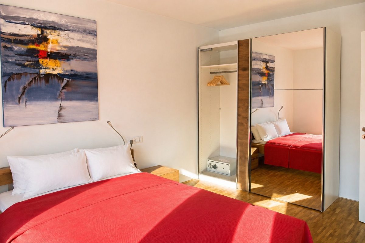 Second bedroom with mirror wardrobe