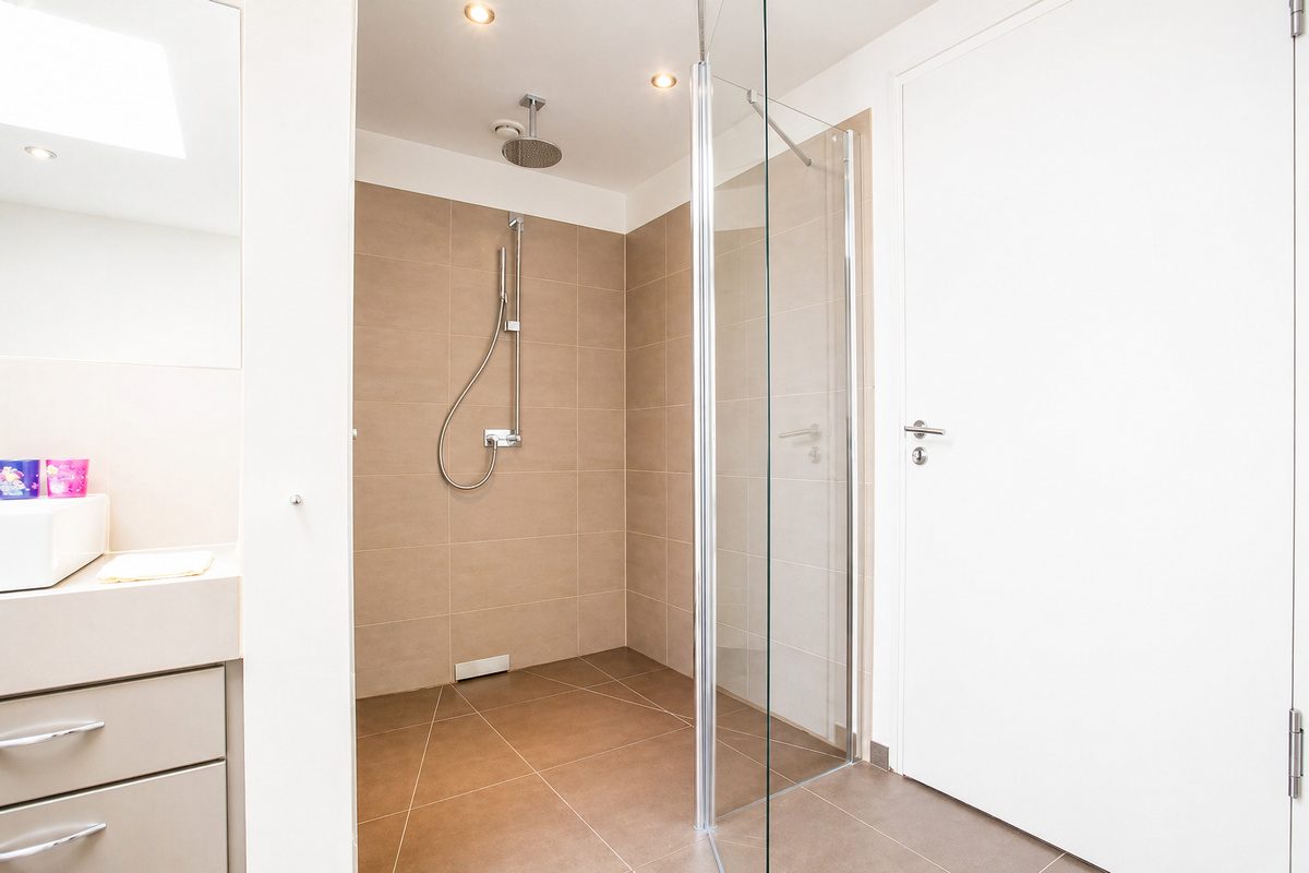 Bathroom with large glass shower