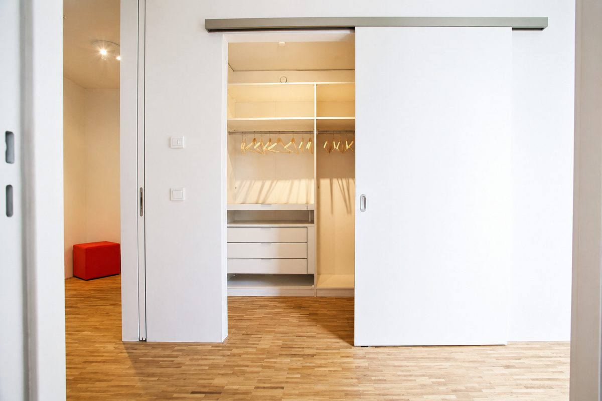 Sliding doors storage in hallway