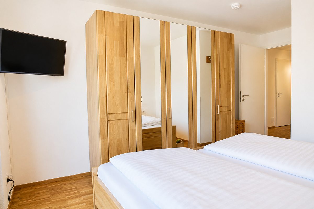 Wardrobe and TV in master bedroom
