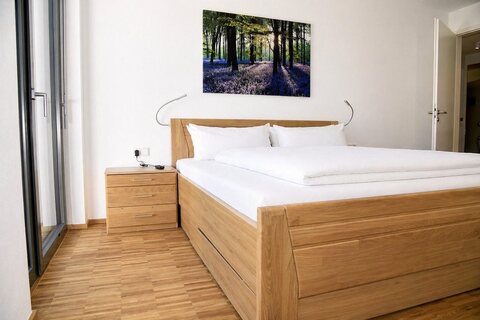 Master Bedroom with king-size bed in 3br apartment