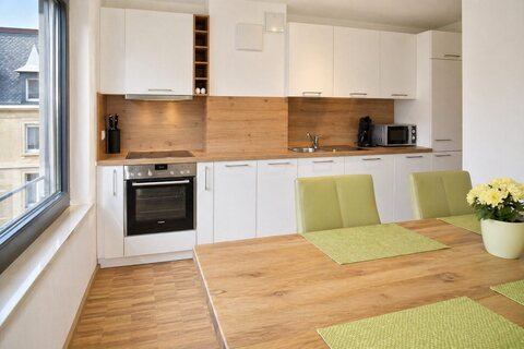 Full kitchen and dining area