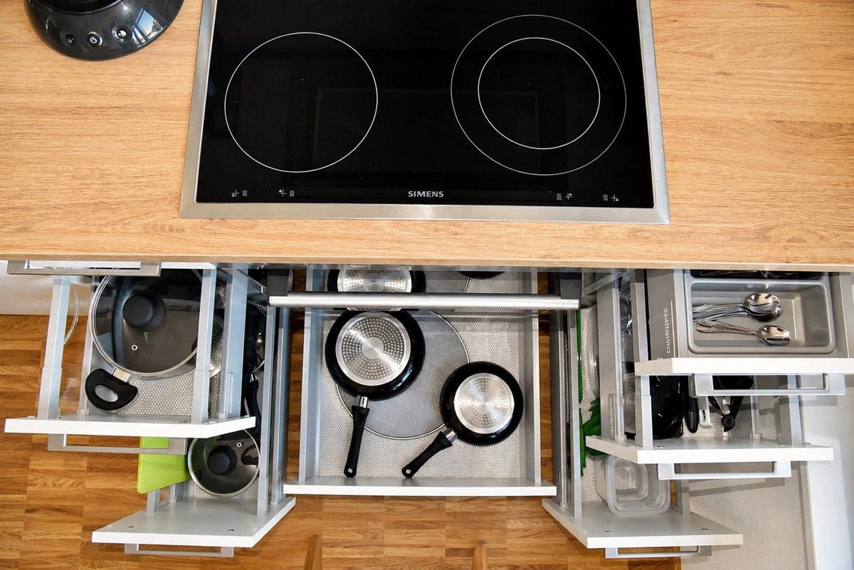 Kitchen with utensils in drawers