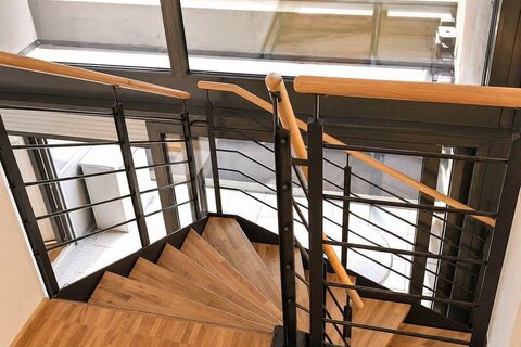 Duplex penthouse staircase with wooden steps