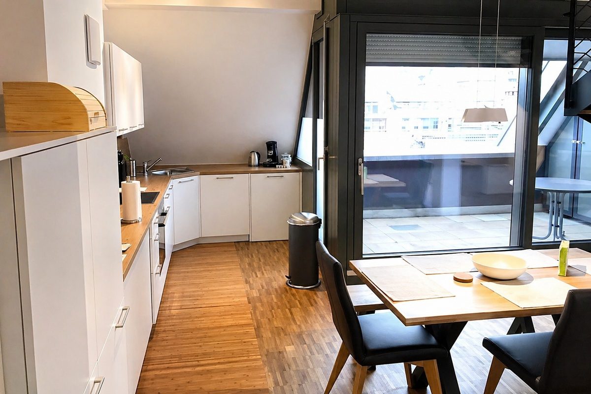 Kitchen with dining table and chairs