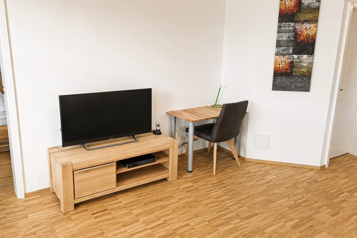 Living room with desk in furnished apartment