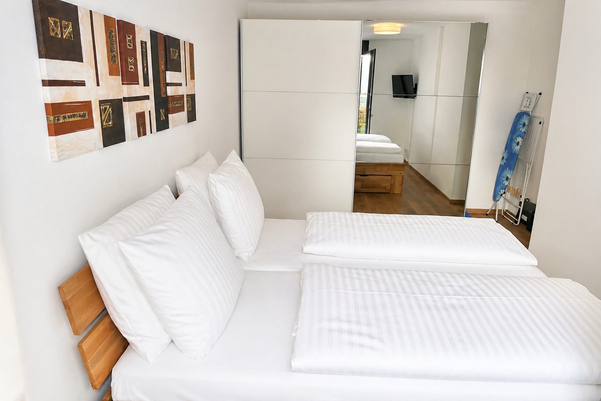 Master bedroom with mirror closet