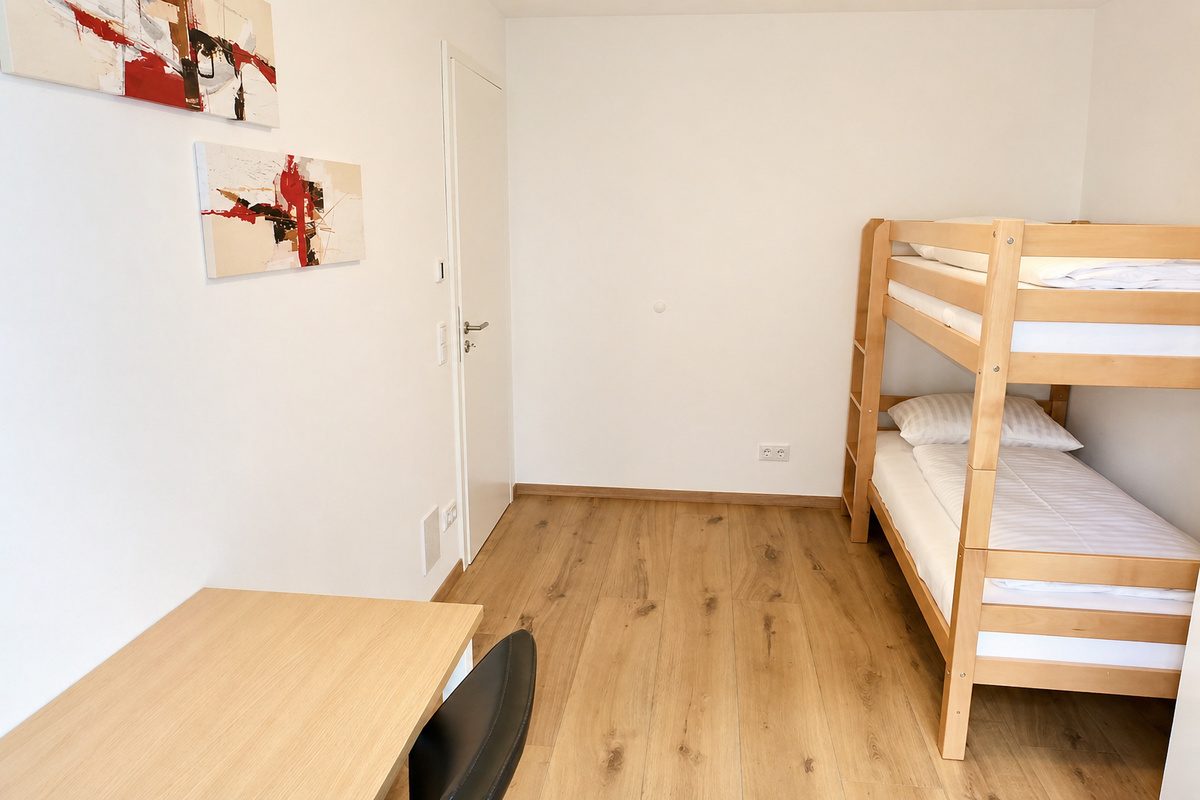 Second bedroom with bunk bed and desk