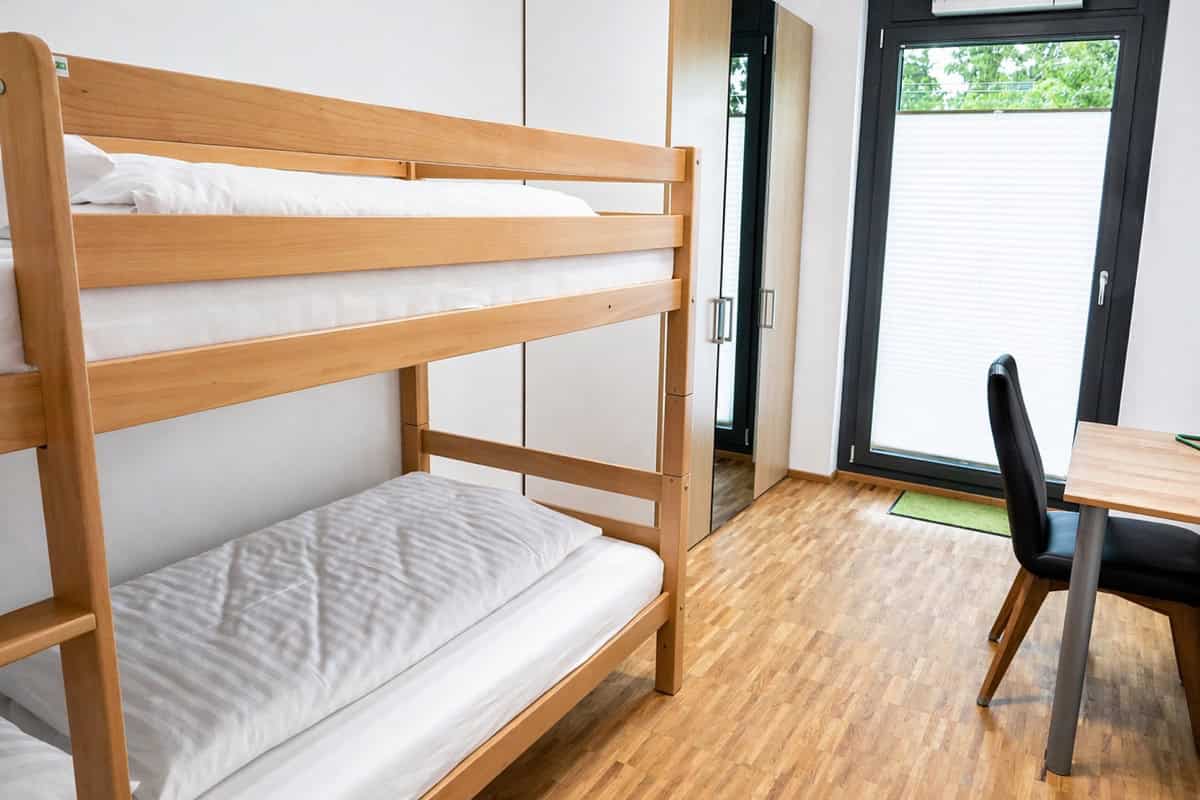 Bunk bed and desk in second bedroom
