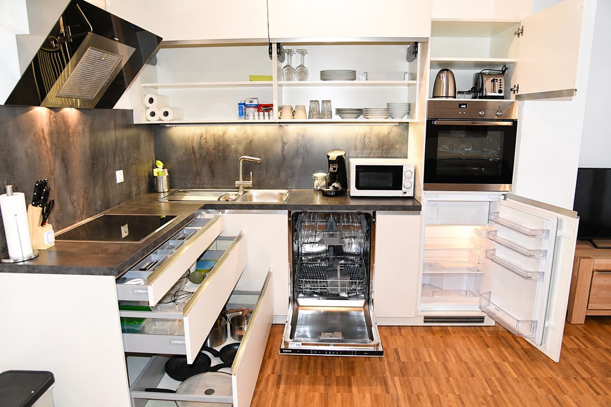 Full kitchen with dishwasher