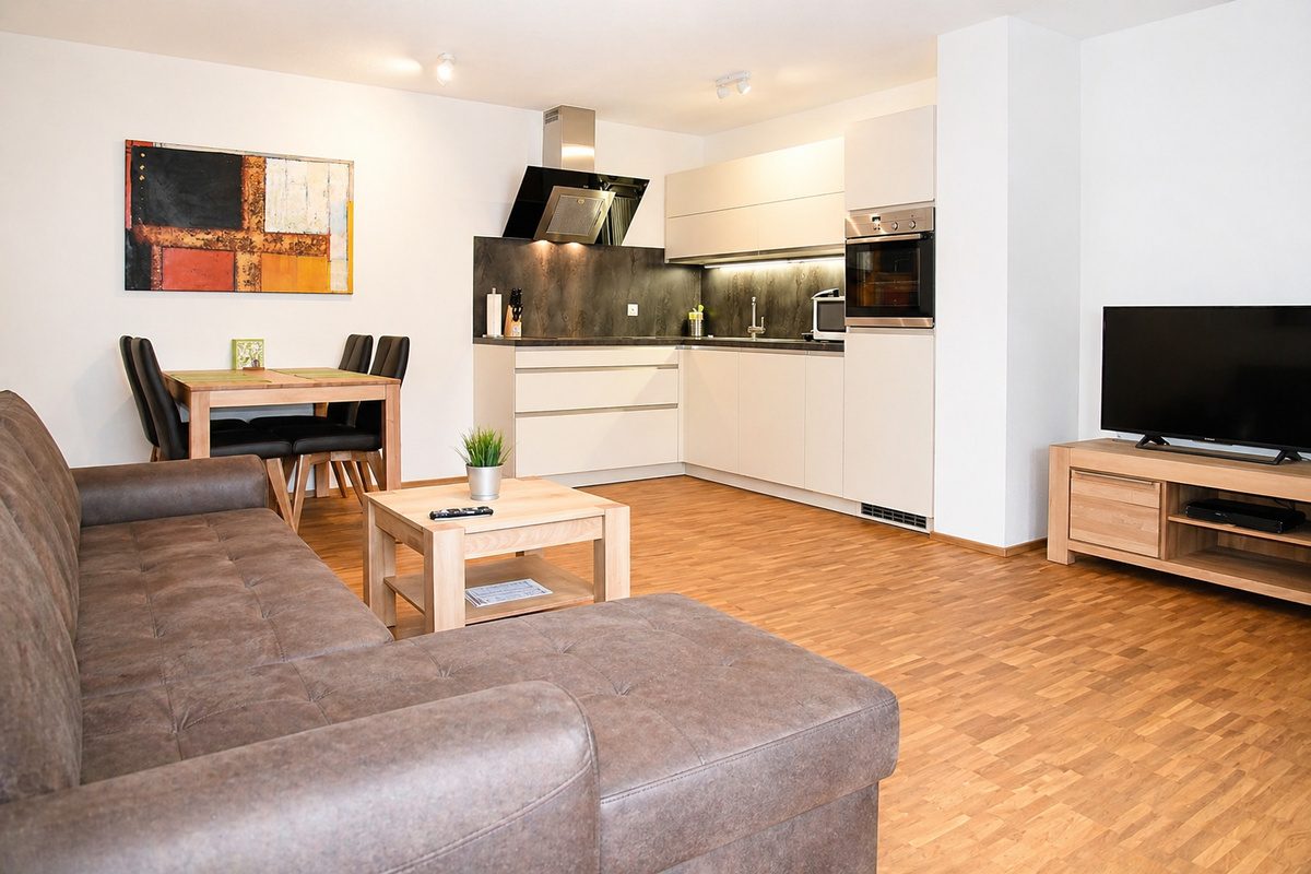 Temporary furnished apartment open living, dining and kitchen area