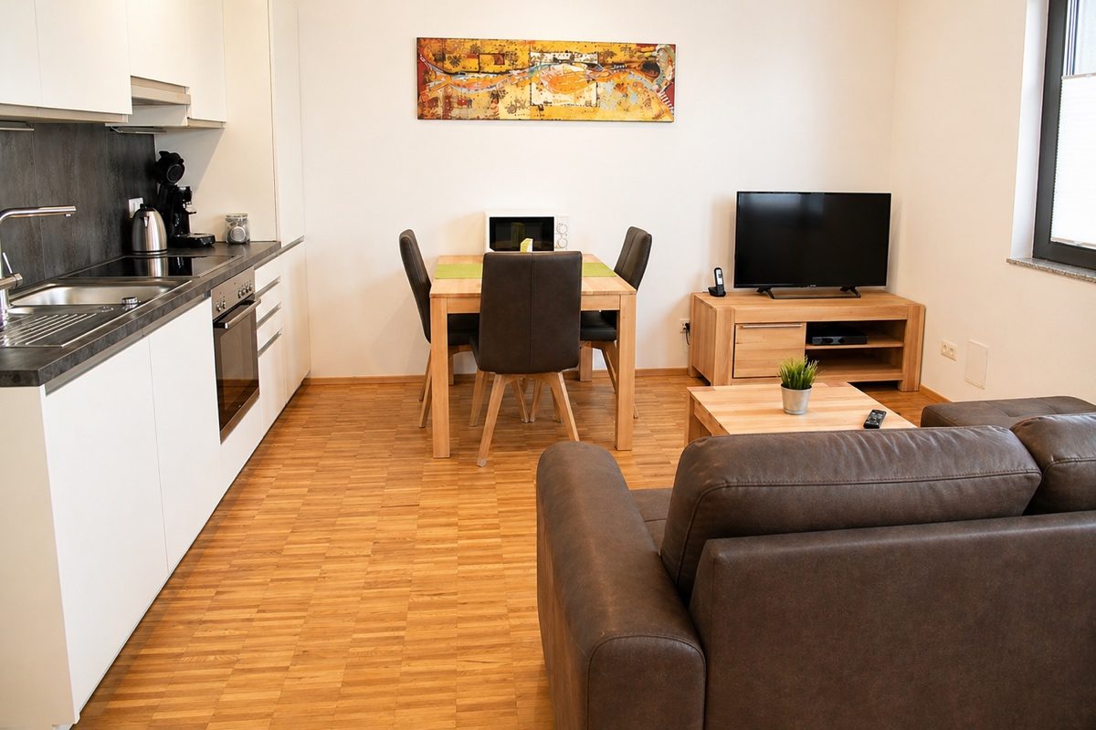 Furnished studio apartment living and dining area