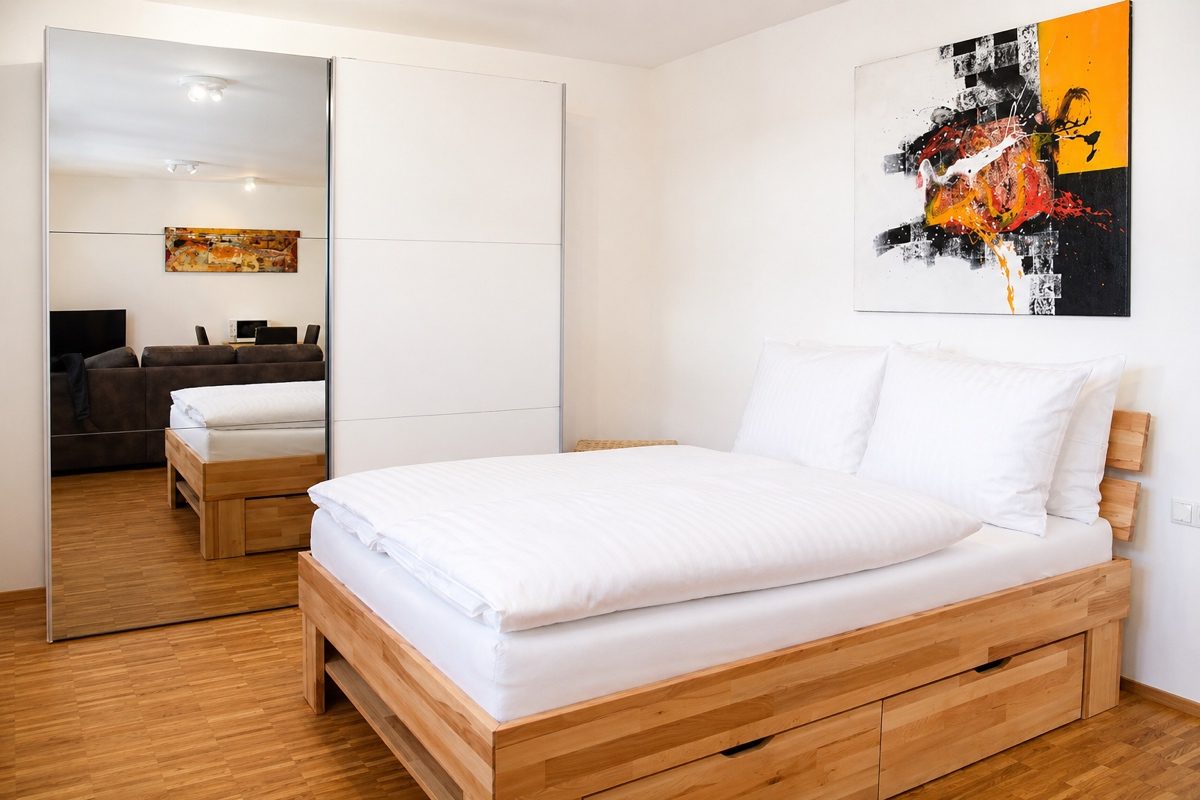 Sleeping area queen-size bed with wardrobe