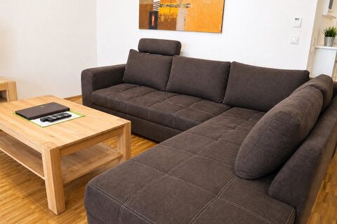 2-bedroom apartment sectional sofa in living area