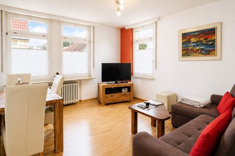 Dining and living room in 1-bedroom apartment