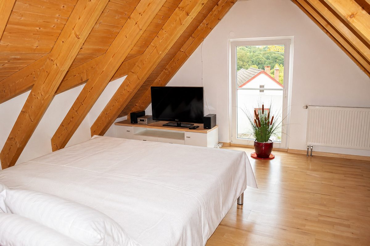 Attic bedroom with king bed
