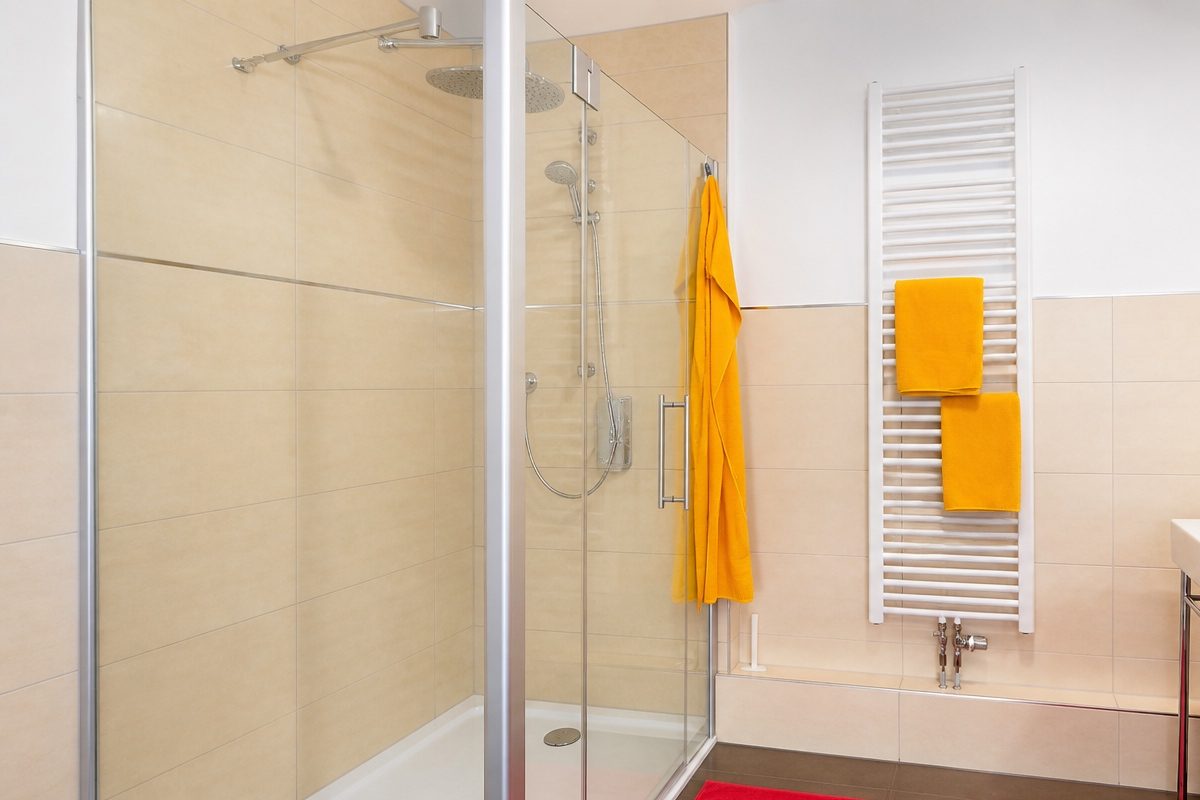 Large glass shower in bathroom