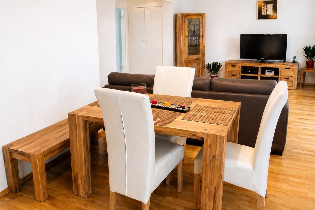 Dining table with chairs in apartment