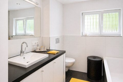 Bathroom with sink and toilet