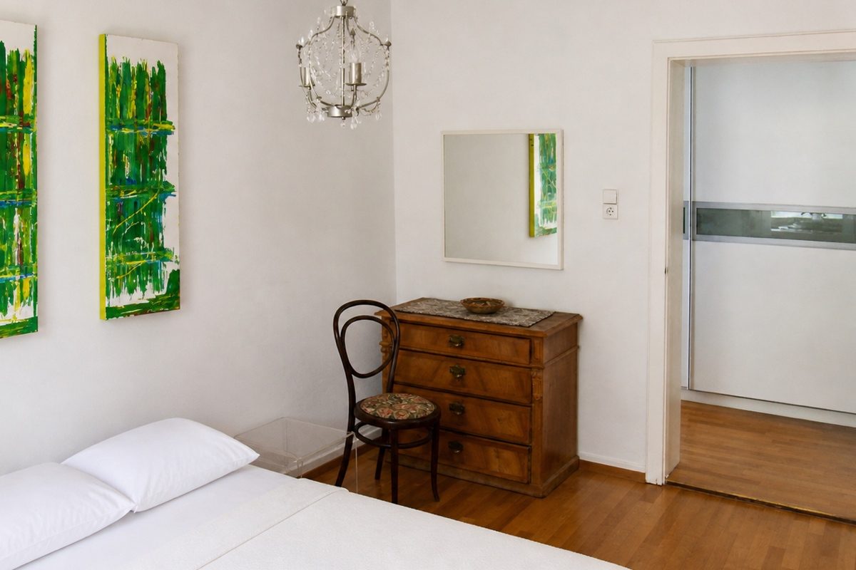 Dresser in bedroom and large wardrobe in hall